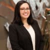 Woman's headshot with blurred background