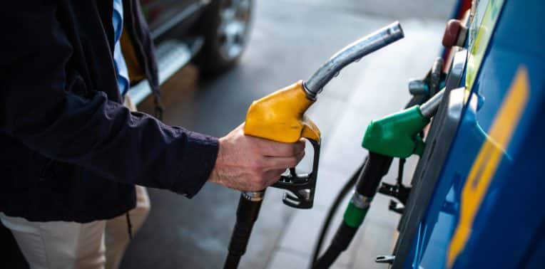 image of man at fuel pump evoking fleet fuel management