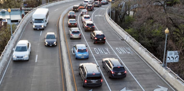 image of vehicles driving on highway, evoking accountable Car Allowance Plan