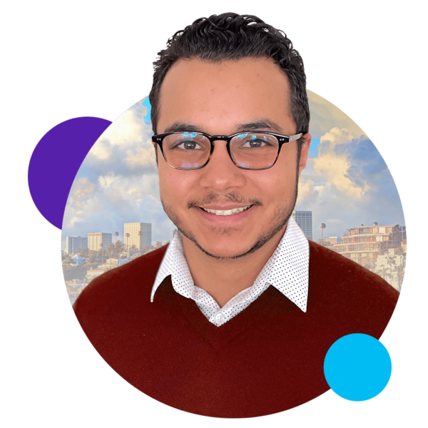 Man's headshot in a circle with a city skyline in the background