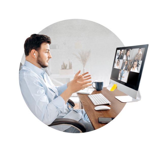 Man talking to seven people on a computer screen