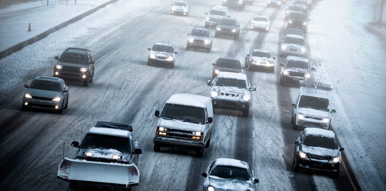 heavy traffic on a snowy street evoking driving safely this holiday season