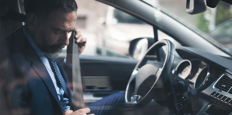 man buckling seatbelt evoking company driver safety program