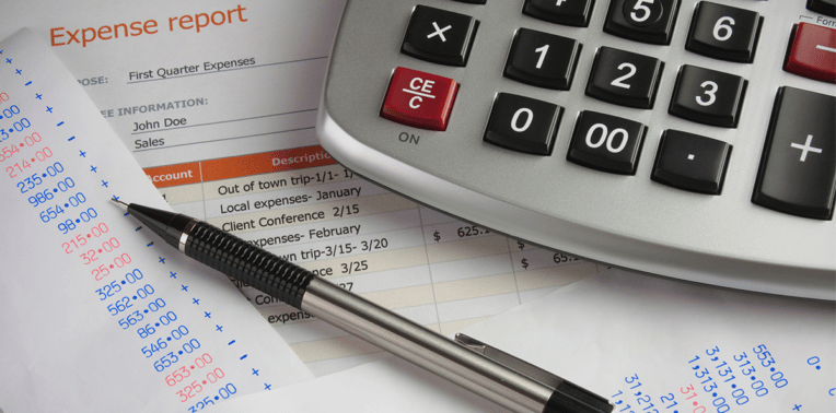 image of receipts calculator and expense report evoking Employee Expense Reimbursement