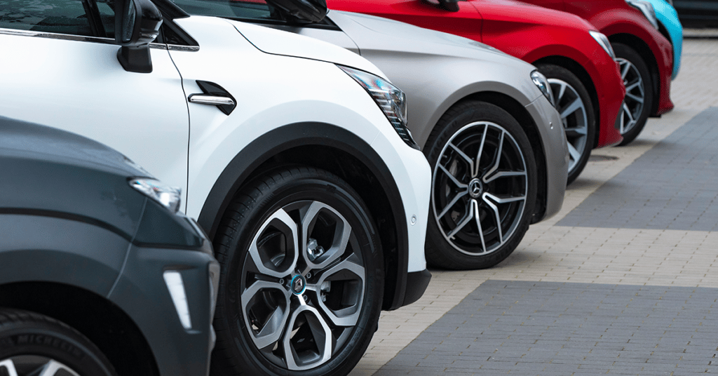 image of parked vehicles evoking company car policy