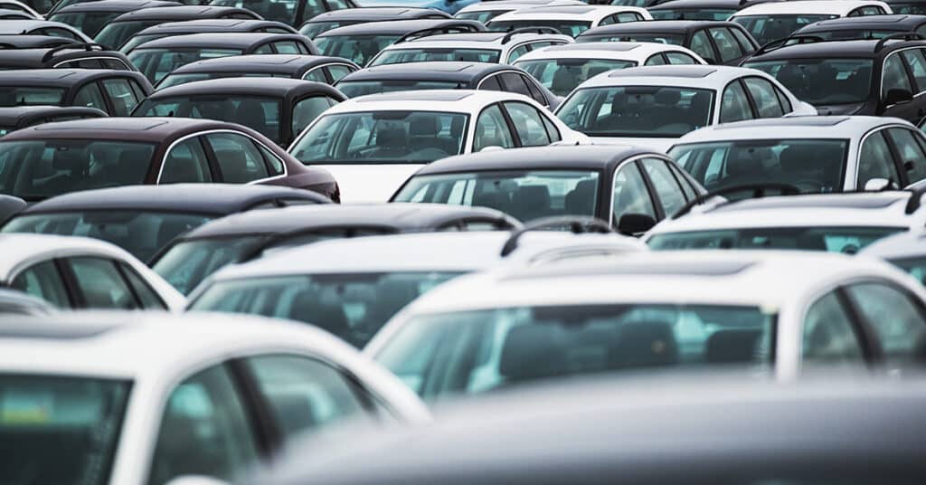 image of lots of cars evoking vehicle recalls