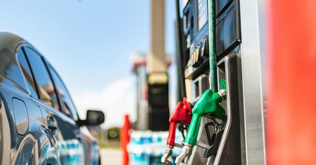 image of car parked at gas station pump